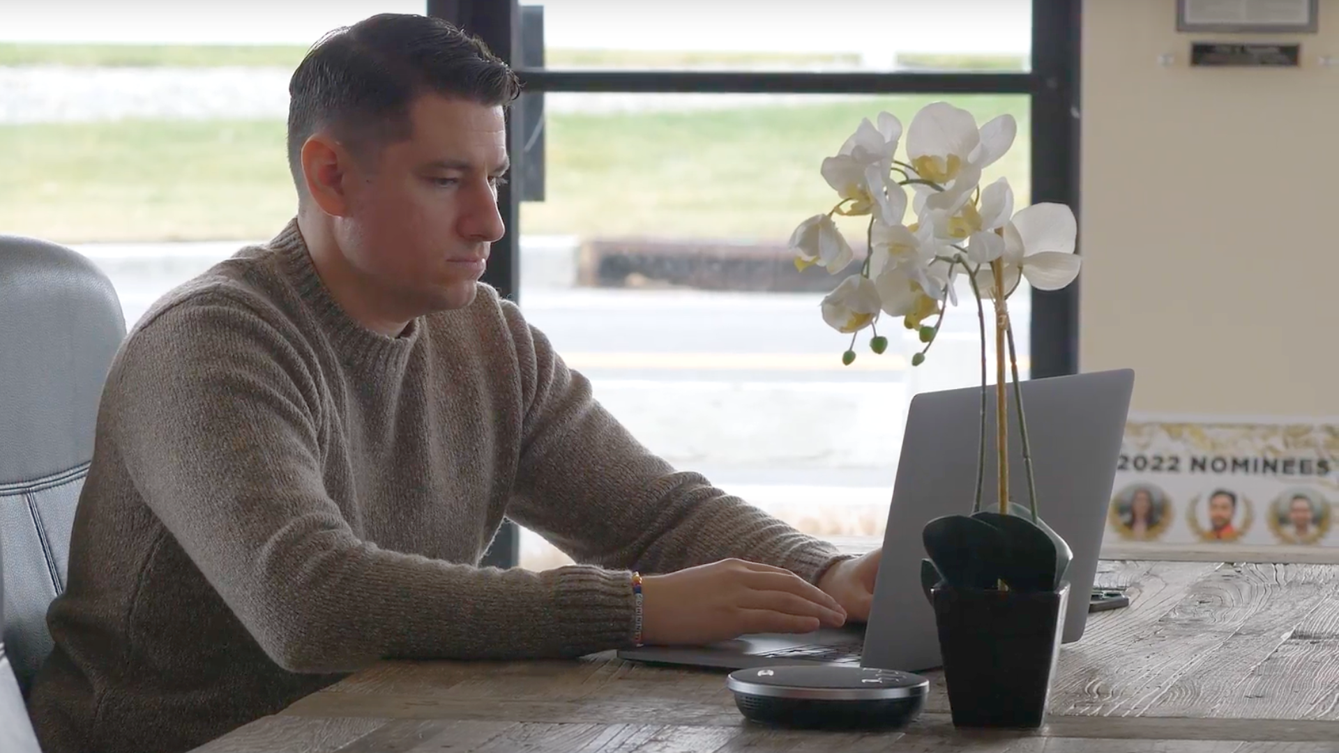 John Vagueiro working on his computer